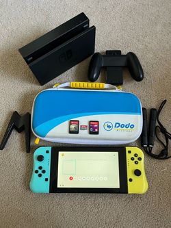 Nintendo Switch with accessories and games