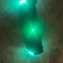 SISIGAD HOVERBOARD GOOD CONDITION RIDES GOOD AND COOL LIGHT UP WHEELS COMES WITH CHARGER