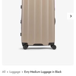 Calpak medium carryon luggage