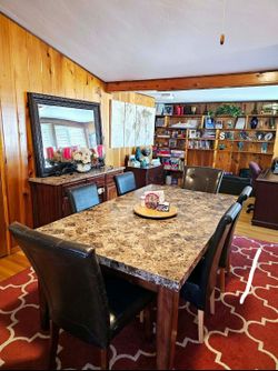 Faux marble dining room table hutch and 6 chairs