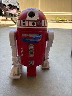 Red and white R2-D2 Star Wars toy.