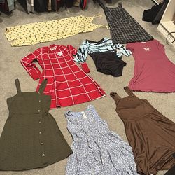 Bag of dresses (and gymnastics leotard)