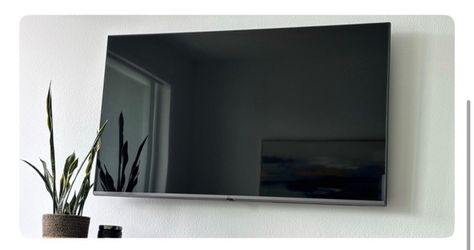 55” LG smart TV with wall mounting bracket  no stand