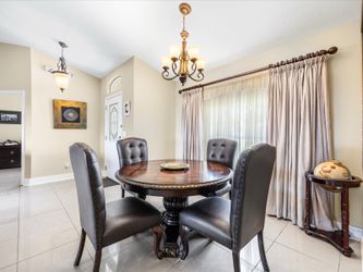 Round Pedestal Dining Table & 4 Upholstered Chairs