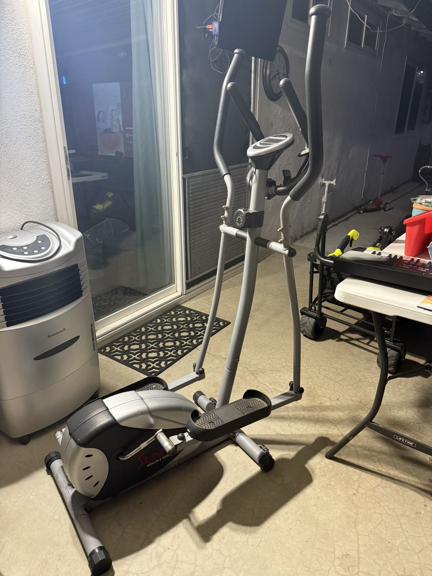 Sunny Health & Fitness Magnetic Elliptical Machine with LCD Performance Monitor, Pulse Sensor, Floor Stabilizers, Low-Impact, Full Body Workout