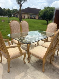 Dining room table with chairs glass top