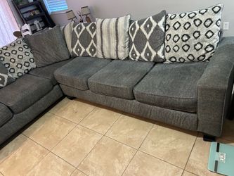 Sectional with full/queen pull out bed.