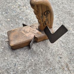 Grip-lite Guide made by Mesa Vista Design, which functions as a specialized woodworking tool for guiding saws or routers securely along a straight edg