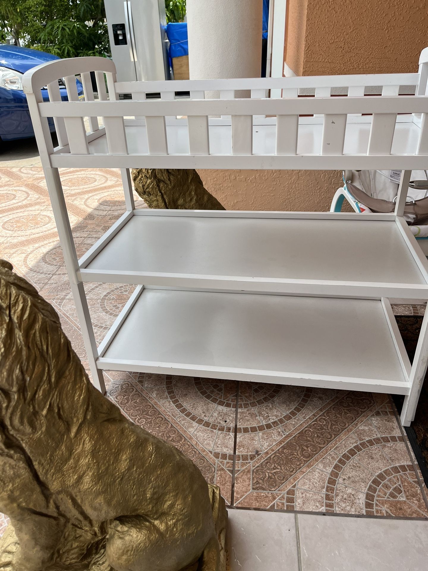 Clean and in good condition changing crib measures 36.5 inches wide, 19 inches high, and 34 inches tall.