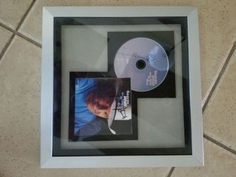 Autographed picture & George Strait CD