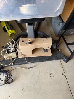 Elna portable sewing machine, likely a Swiss-made model like the Elna Super or SU series,