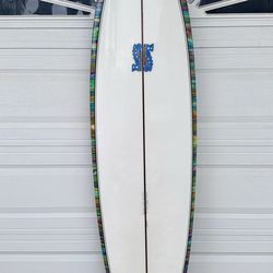 7'2" mid-length surfboard by Matt Bettis