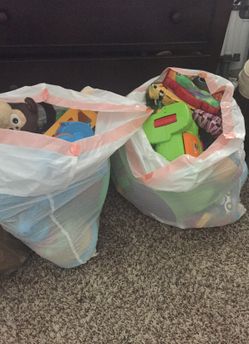 2 full bags of various baby/kids toys