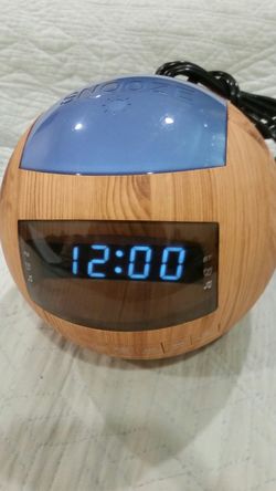 Bluetooth alarm clock,radio,dual USB charging ports,night light.