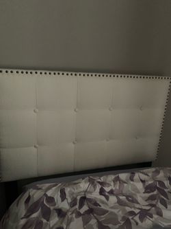 Twin beds two with beaded headboards