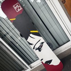K2 Darkstar Snowboard with lexa burton bindings