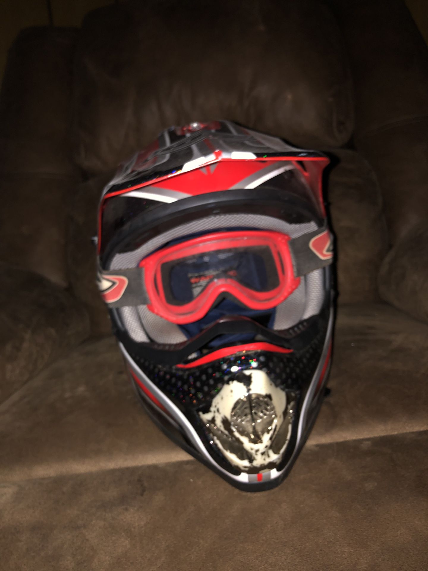Photo Dirt bike helmets blue one is medium red one is small