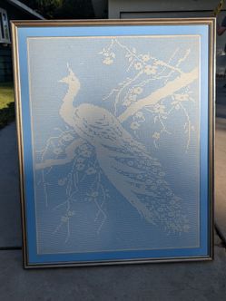 Crochet peacock artwork