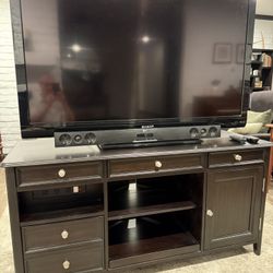 Sharp 60” Flats Screen With Soundbar & Media Cabinet