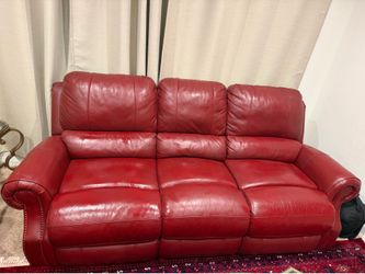 Red leather reclining loveseat