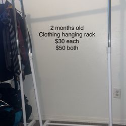 Clothes hanging rack