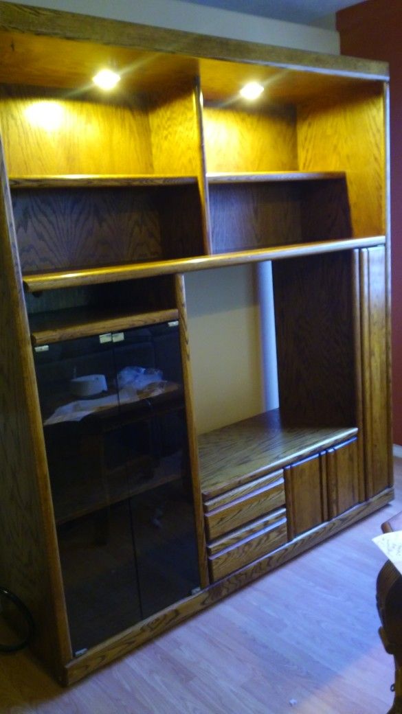 Wood Entertainment Center. Very well Kept.