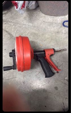 Rigid handheld drain snake