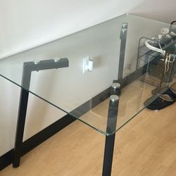 Glass table and four chairs 