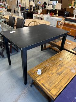 Tall black dining table (in store)