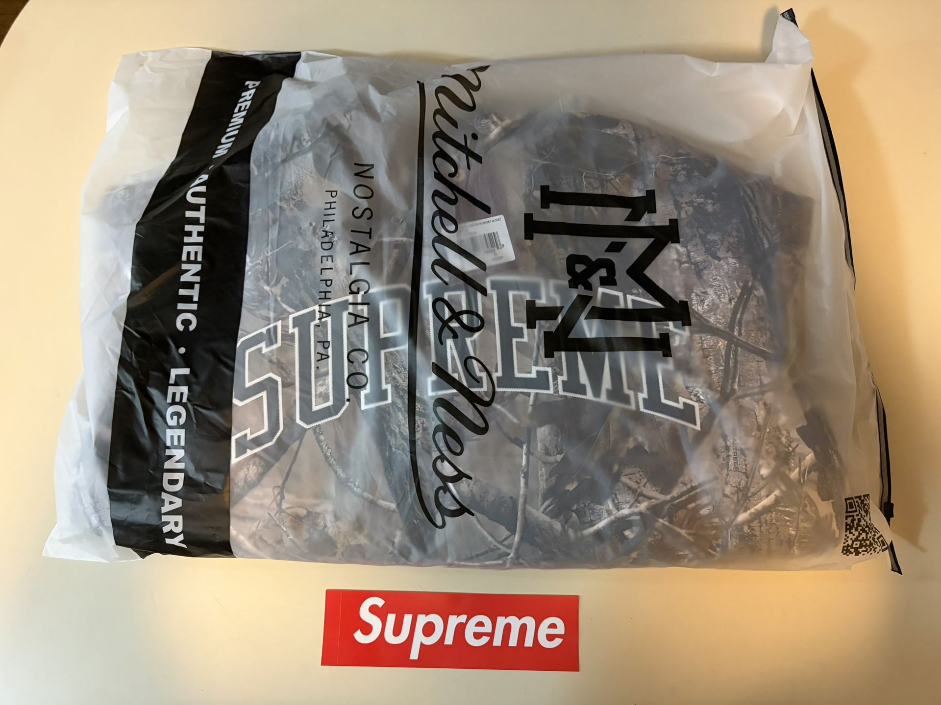 IN HAND SUPREME MITCHELL & NESS VARSITY JACKET (CAMO)(MEDIUM)
