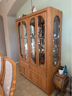 Solid oak hutch with glass shelves with drawers and storage space