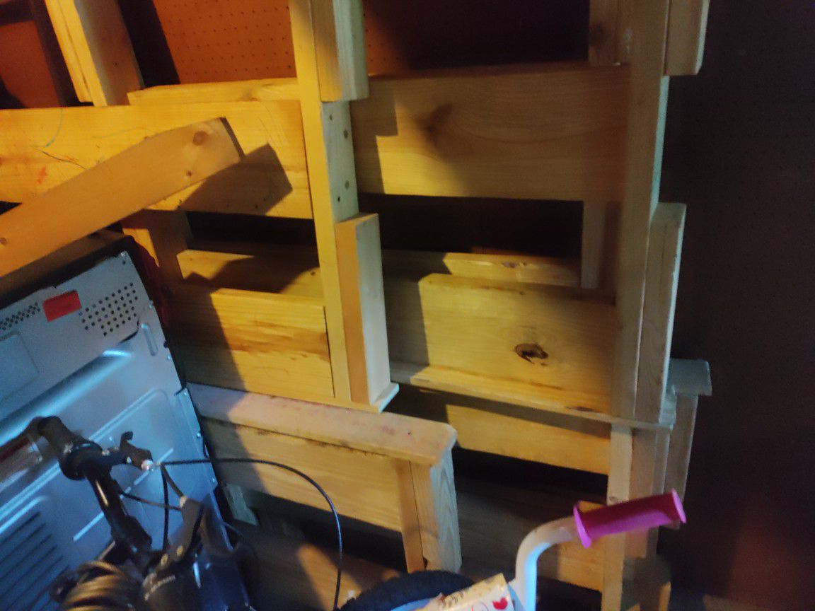 A Set Of Bunk Beds (2 Sets- 4 Bed Frames Total) Used And Garage Kept. Wooden Frame