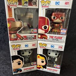 Superman, The Flash, Wonderwoman and Toucan Funko Pops
