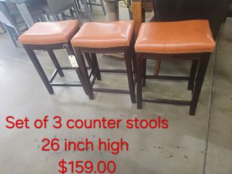 Set of 3 Saddle Counter Stools 26 Inch We are located at 2811 East Bell road. Another Time Around Furniture.