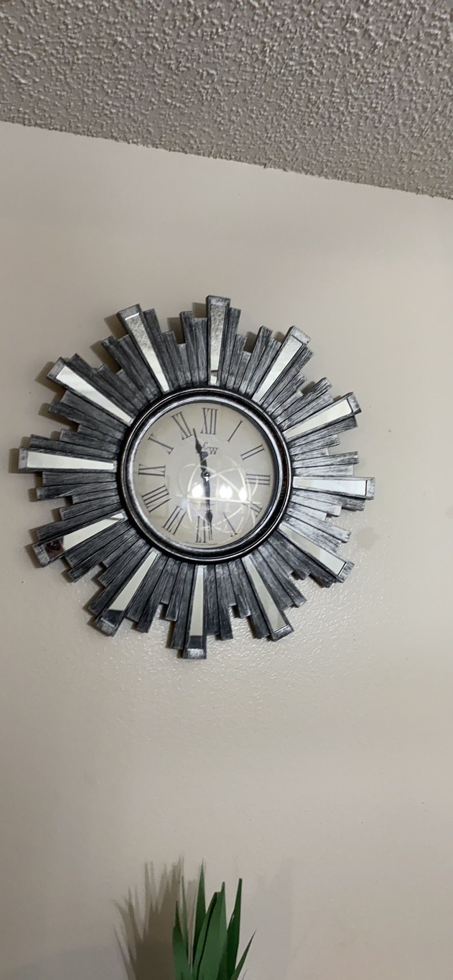 mirrored wall clock