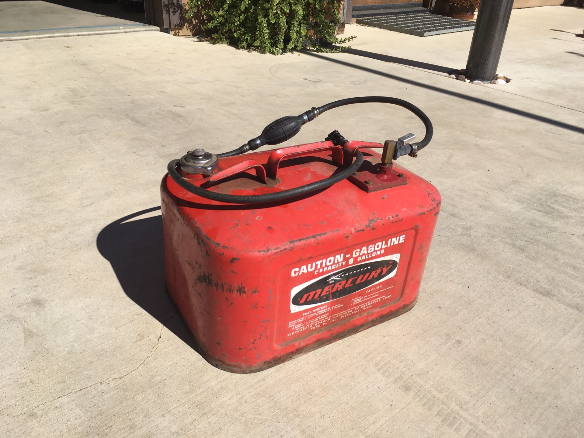 Vintage outboard fuel can