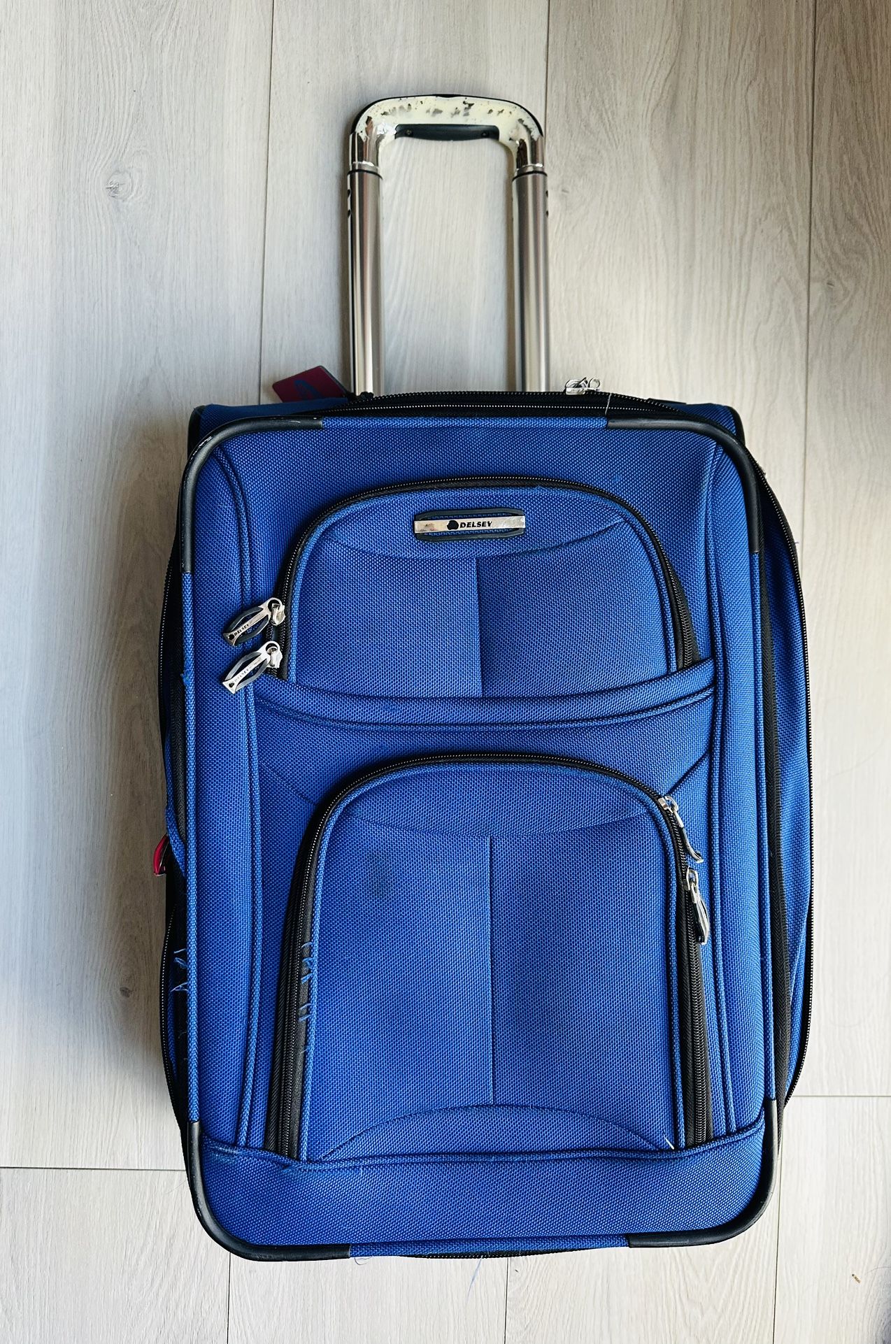 Delsey Carry On Luggage Used & Handle Chrome Paint Peeling
