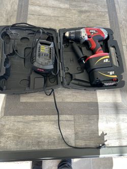 SKIL XDROVE DRILL WITH THE BOX CHARGER AND 2 18v BATTERIES