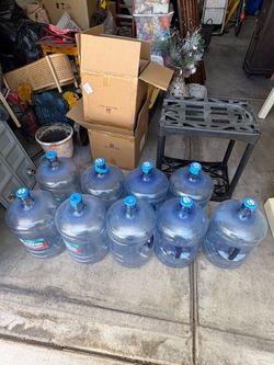 9 fiveGallon Water Bottles