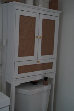 White Over-the-Toilet Storage Cabinet with Rattan Doors