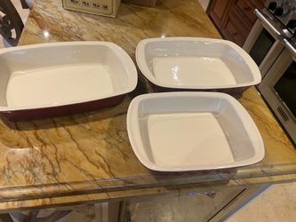 Three casserole dishes, red, and color