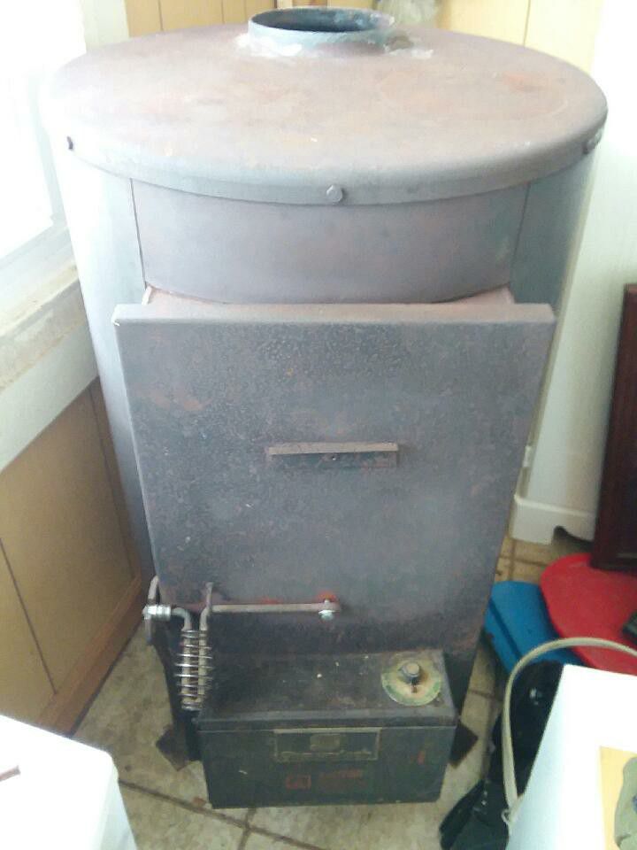 Shenandoah wood heater w/stove pipe w/damper