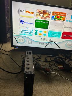 Black Wii console all wires
