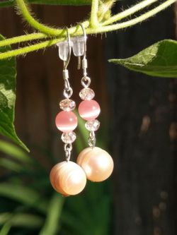 Sterling Silver Earrings with geniue cat eye, Freshwater Pearls and Swarovski crystals.