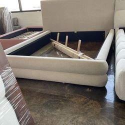 New Queen size platform upholstered bed. Light gray