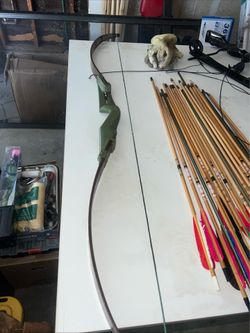 Bear archery bow with arrows