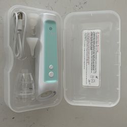 Baby nasal aspirator with unused attachments