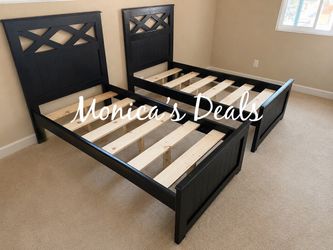 2 Twin Solid Wood Bed Frames $600