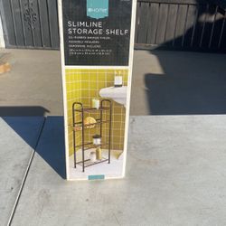 Slimline storage shelf for bathroom or kitchen