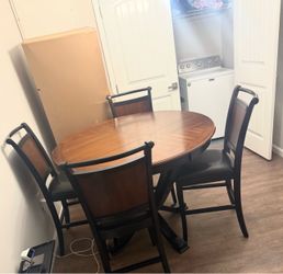 Dining room table and chairs.  NOT SURE of dimensions